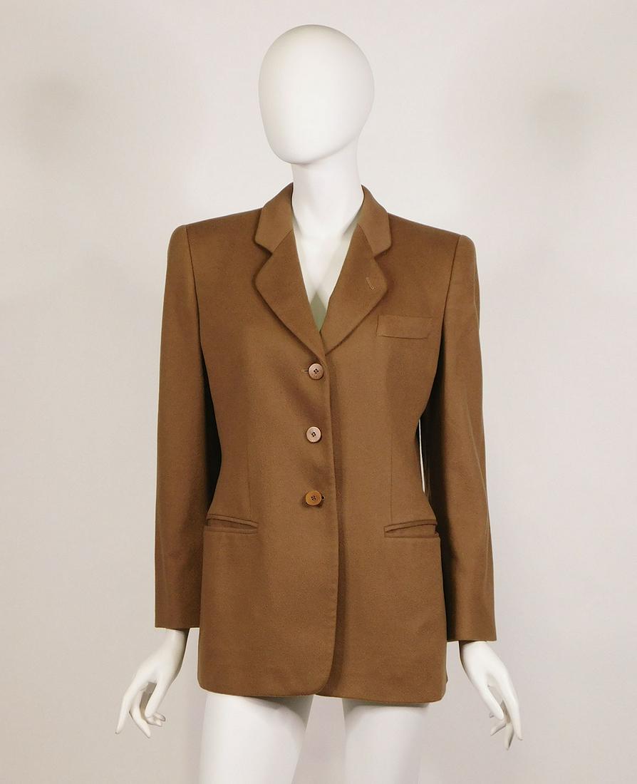 Giorgio Armani Collezioni: Women’s Suiting: A collection of Giorgio Armani Le Collezioni womenÂ’s suits and separates, mostly size 10 US. 1980s/1990s. Comprised of: a) a navy blue pinstripe pantsuit, the jacket size 10 and the pants size 12,