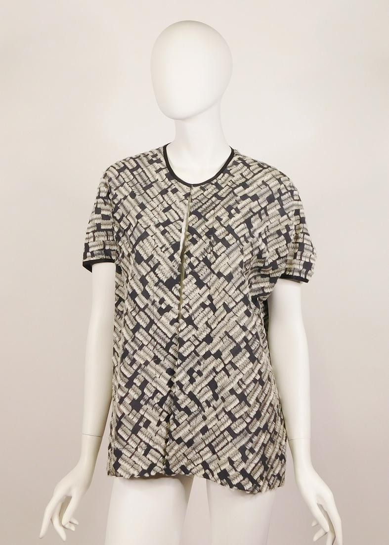 Zero + Maria Cornejo Koya Shrug: A Zero + Maria Cornejo Koya Shrug in Silk Caterpillar Gauze, Ink Jet/White Pepper. New with designer and Barneys retailer tags, never worn. Size 6. Made in USA. Along with an Issey Miyake white pleat-