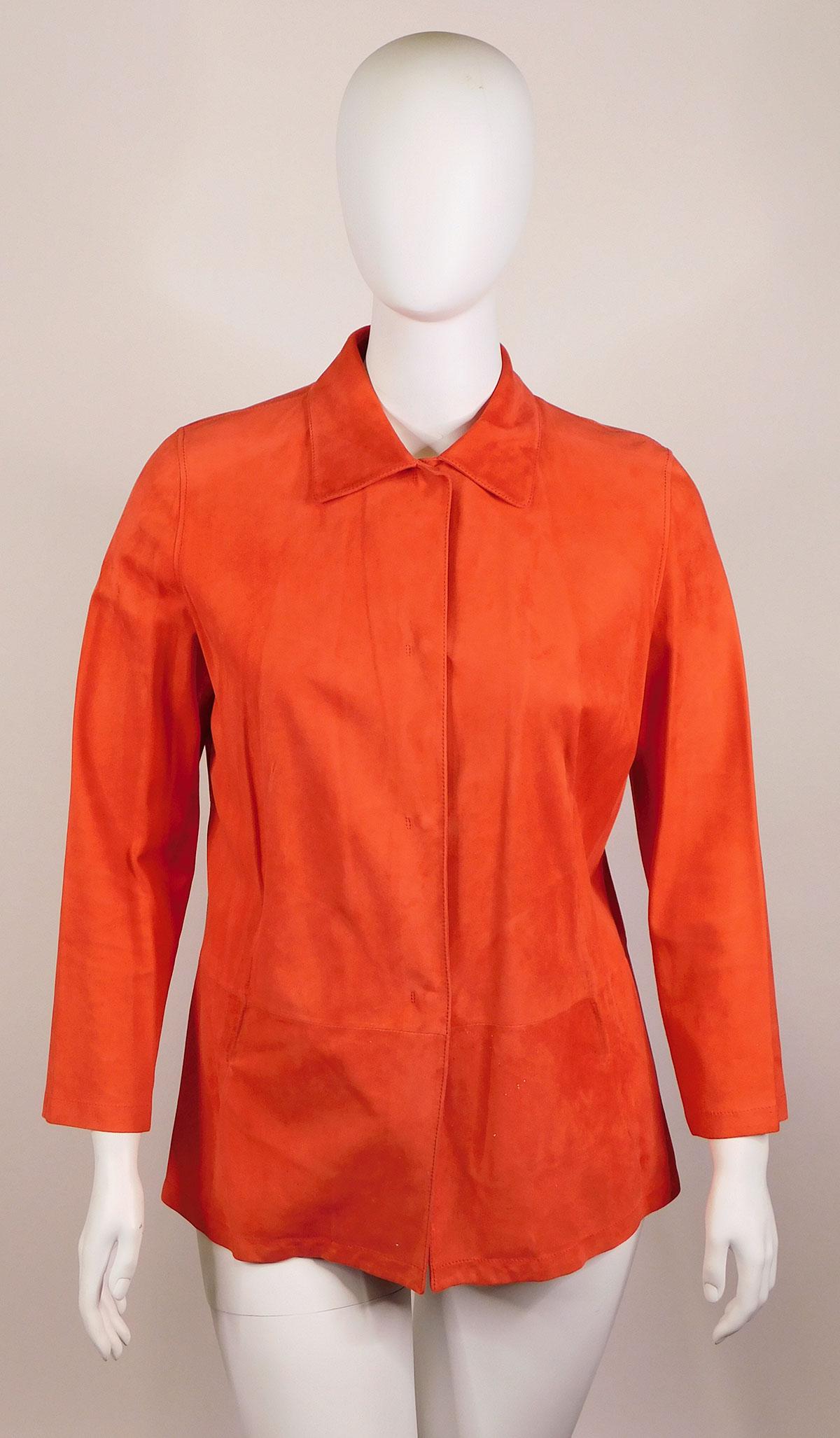 Loro Piana: Two Jackets: Two Loro Piana women’s jackets, both marked size 50. Comprised of a) an orange shirt/light jacket, 100% flax; and b) a pale red 100% suede goatskin jacket. Both made in Italy. Condition: Both fine, 