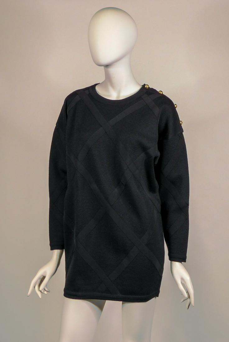 Salvatore Ferragamo Wool Sweater: A Salvatore Ferragamo black sweater with brass decorative buttons. Marked size XS. 100% virgin wool. Made in Italy. Condition: Very good, no apparent defects. Condition: Very good, no apparent defects