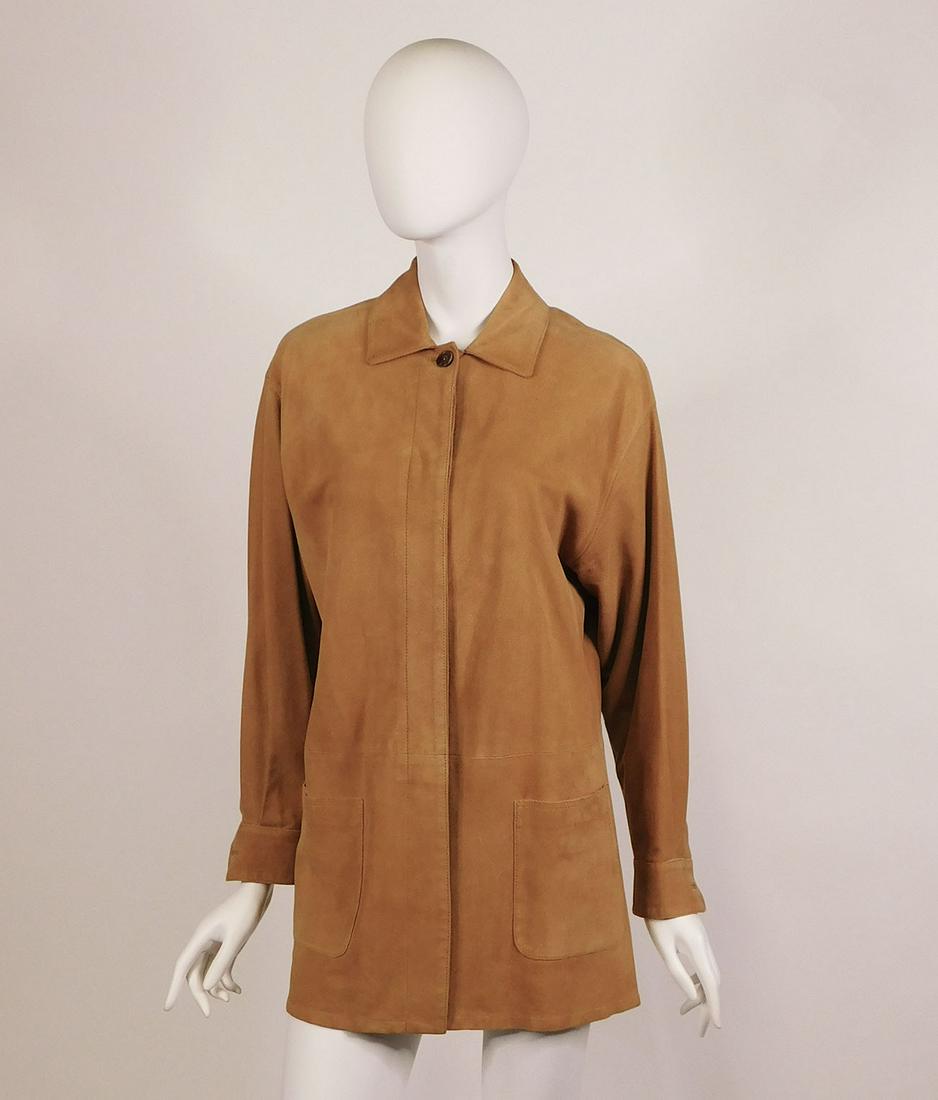 Loro Piana: A Women’s Leather Jacket: A Loro Piana unlined women’s soft leather jacket in a camel color. Two front pockets, concealed front buttons. 100% leather. Size M. Made in Italy. Condition: Very good, minimal wear.