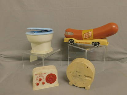 4 Vintage Plastic Banks: Four Vintage Plastic Banks includes: Oscar Mayer Weiner Car, 10"l, "Down The Drain Bank" battery operated in toilet form with pop up figure, 4 1/2"h, Ideal Radio bank, and a Bancloh registering round