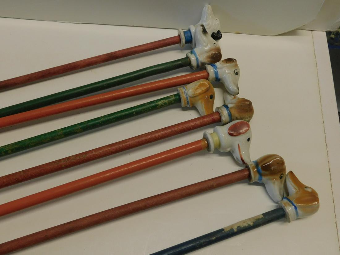 8 Porcelain Dog Head Carnival Canes (1 of 3)
