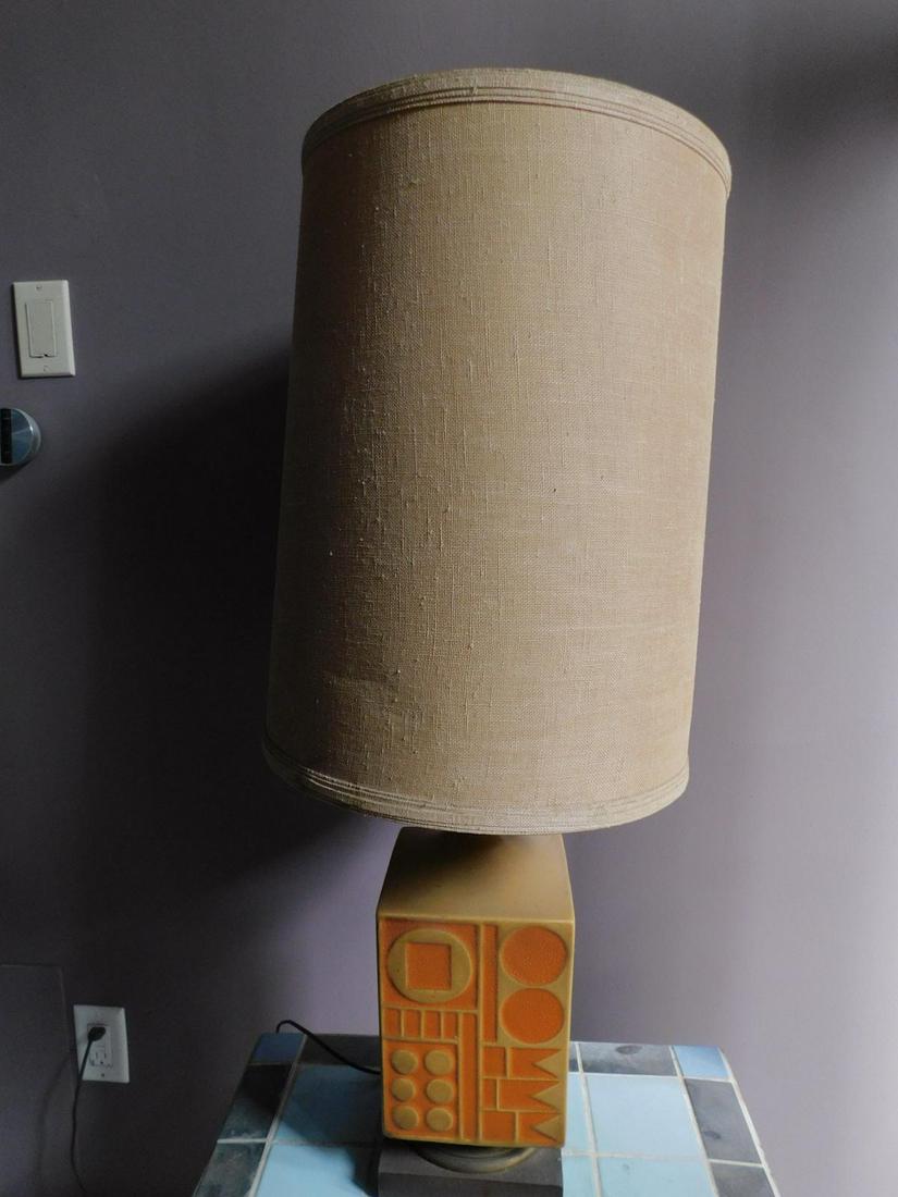 Mid Century Modern Table Lamp: Mid Century Modern Table Lamp, square form glazed and embossed pottery on wood base with burlap shade, 33" h. Condition; good