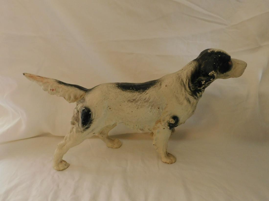 Cast Iron Door Stop: Cast Iron Door Stop, setter dog, late 20th c. 15" h. Condition; minor wear