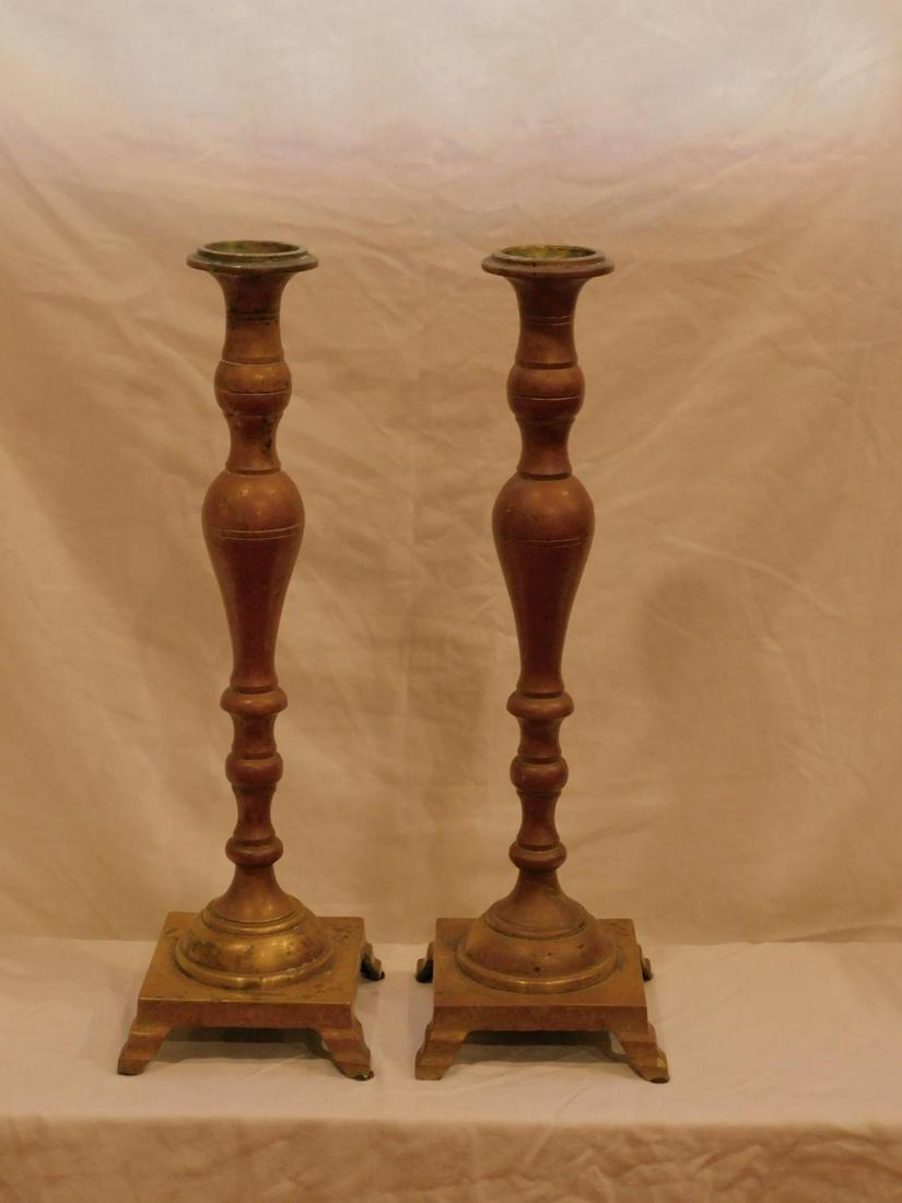 Pair Tall Brass Candle Sticks: Pair Tall Brass Candle Sticks, urn and ring turned columns on footed square bases, 19" h. 19th / 20th c. Condition; minor wear