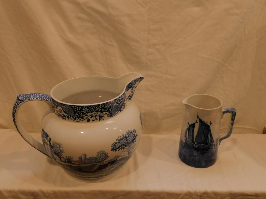 2 Blue and White Pitchers: 2 Blue and White Pitchers, Spode large 9 1/2" bulbous form with Continental landscape and Delph boat scene pitcher. Condition; very good