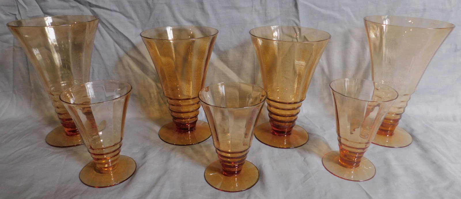 31 Amber Goblets: 31 Amber Goblets including; ten 6" water, seven 5 1/2" wine and fourteen 4" cordials. Condition; good, no chips or cracks
