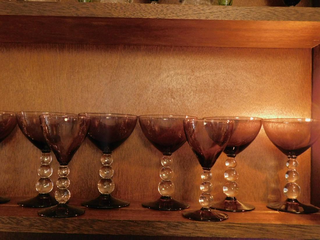 17 Amethyst Goblets: 17 Amethyst Goblets with stacked clear glass ball stems, plus 10 port glasses, 4 1/2". Condition; very good