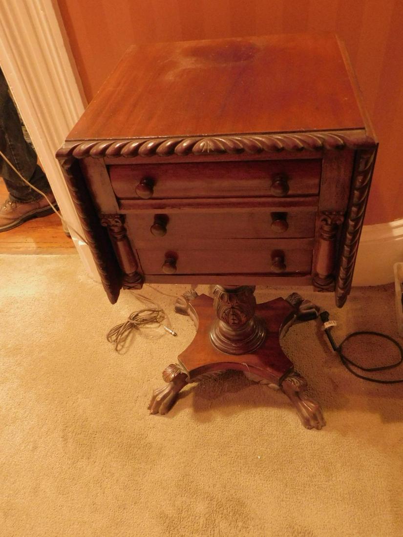 Empire Revival Sewing stand: Empire Revival Sewing stand, mahogany, drop leaf sides with gadrooned edges, three hand dove tailed drawers, claw feet, late 19th c. 16 1/2" x 16" x 29 1/2" Condition; good, vintage condition with min