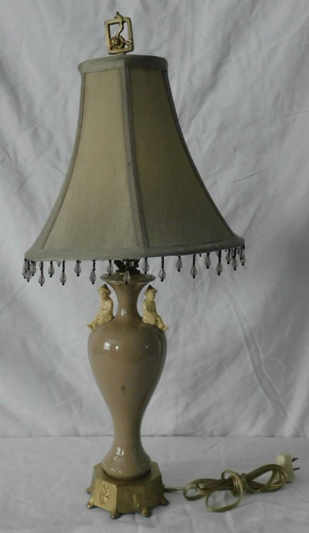Lenox Oriental Porcelain Vase Lamp: Lenox Oriental Porcelain Vase Lamp with sculptured figure, cast metal base with relief figures, silk shade, Condition; very good
