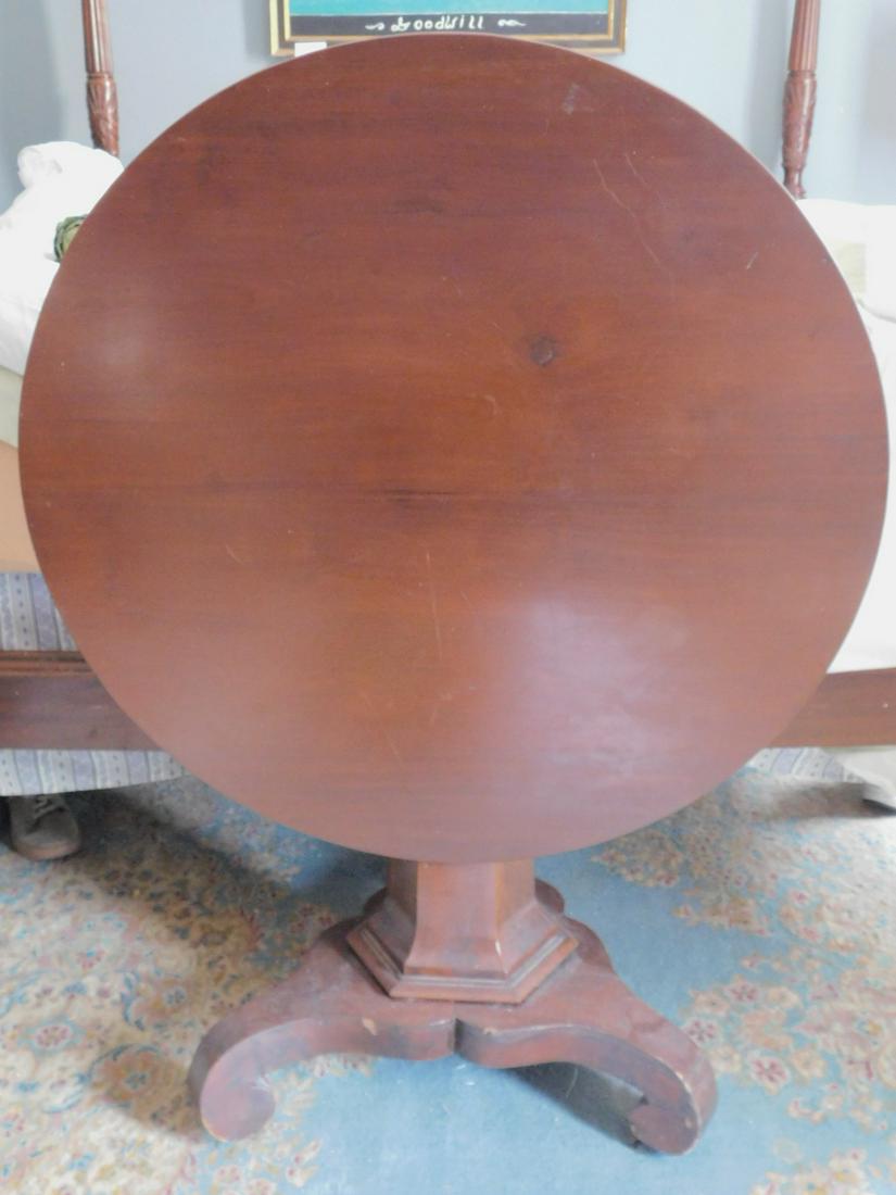 Empire Breakfast table: Empire Breakfast table, mahogany, 35 1/2" round tilt top, hexagonal base with C scroll feet, early 19th c. Condition; good, modest wear