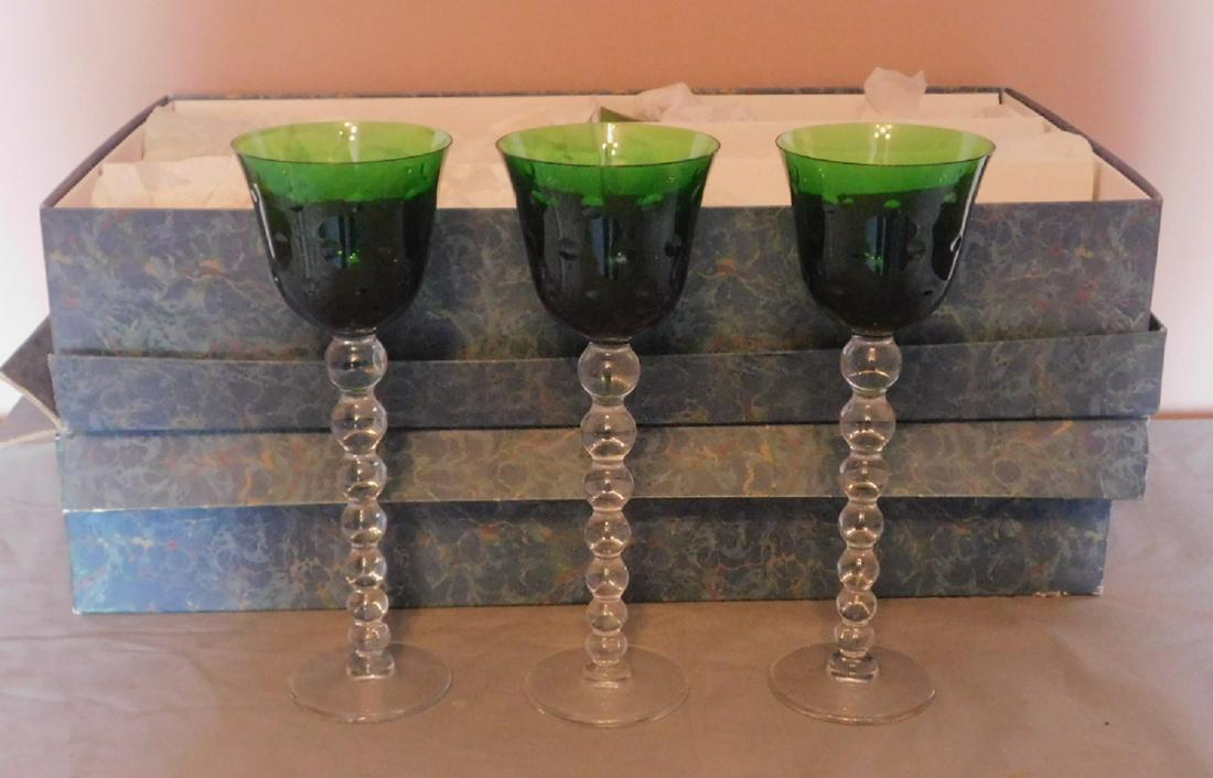 12 St Louis Crystal Goblets: 12 St Louis Crystal Goblets, green crystal bowls with concave button design on clear crystal stacked ball stems, 9 1/2" h. each, Condition; like new, still wrapped in original boxes