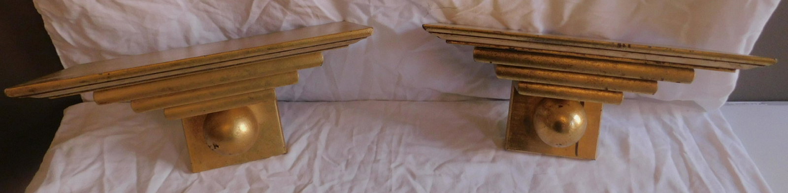 Pair Wall Brackets: Pair Wall Brackets, gilt composition in stepped form with sphere supports, 8" x 14" x 6 3/4" Condition; very good