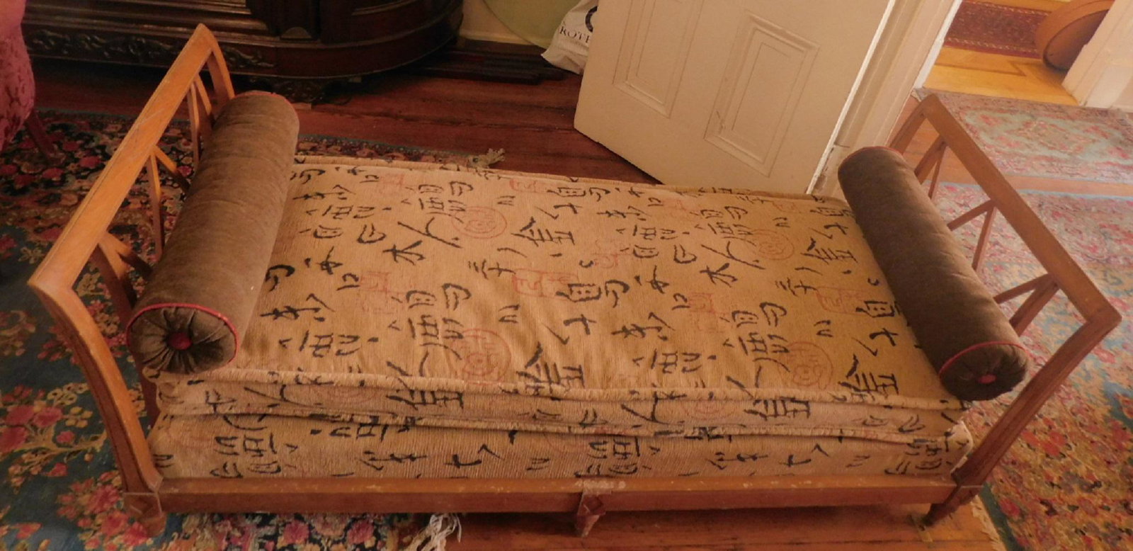 French Regency Day Bed: French Regency Day Bed, cherry frame including; tan and black Oriental calligraphy pattern bedding, plus cushions. Condition; very good