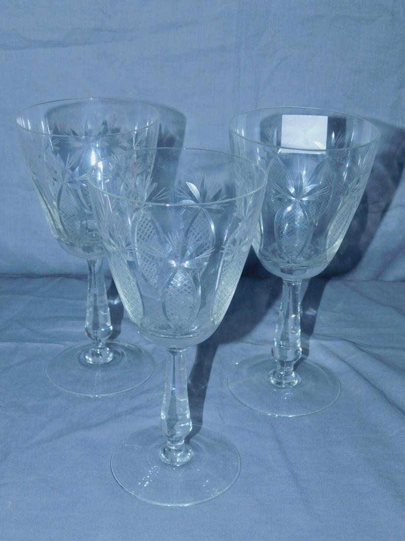 Cut crystal water goblets: Cut crystal water goblets, cut and etched pineapple design, 7 1/2" h, Condition; good, most still wrapped in paper