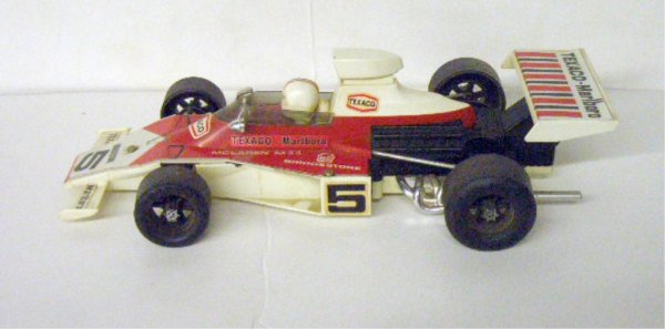 1970's Battery Operated McLaren M23 Race Car: 1970's Son-Ai Toys Japanese Battery Operated McLaren M23 Race Car, Automatic Stop & Go Action, Smoke Comes Out Of Rear