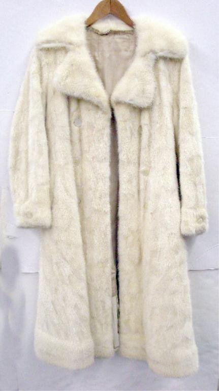 1960's White Mink Fur Coat: 1960's white mink double breasted fur coat, approximate size 6, Sheila Barsky name stitched on lining