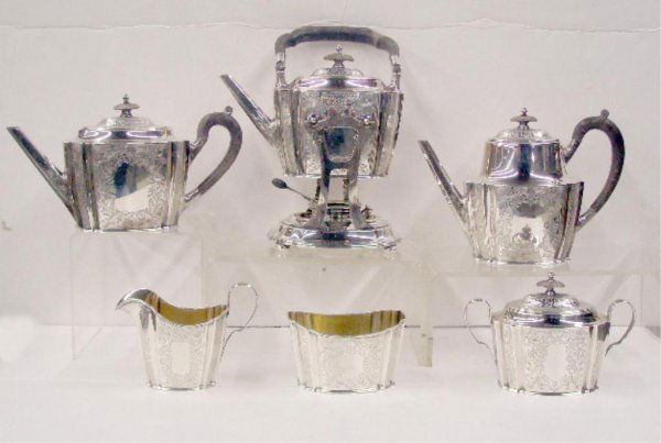 Gorham Sterling Silver Tea Set: Gorham for Bailey, Banks & Biddle, sterling silver six piece tea set w/chaised floral design, 12" three pints swinging tea kettle (9"), on stand (6"), 7" teapot (2 3/4" pint), 6" coffee pot (2 1/2" pi