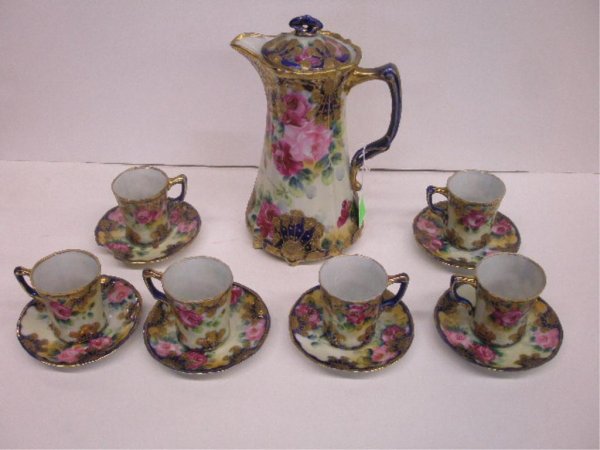 Nippon Hand Painted Chocolate Set: Nippon Hand Painted Porcelain 13 Pc. Chocolate Set in rose & gilt pattern, early 20th c., pot height 10 3/4"