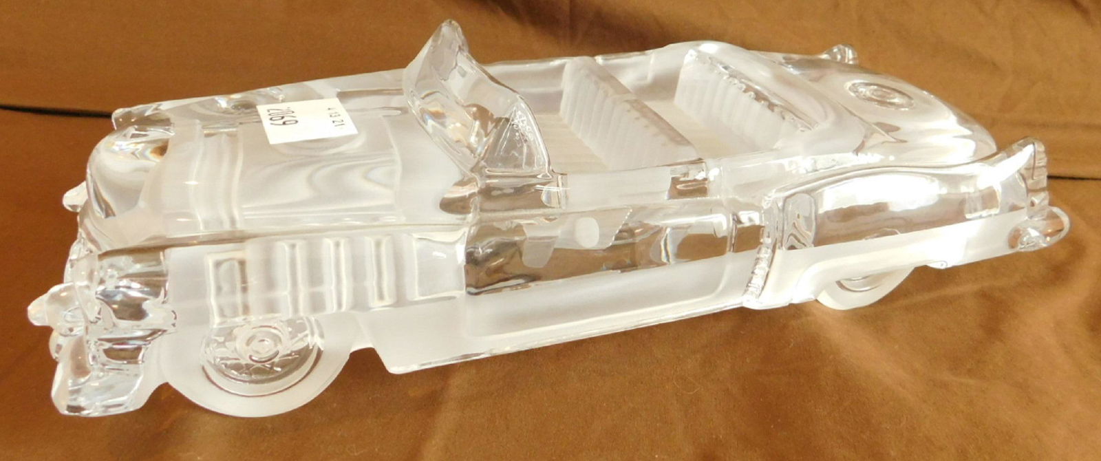 Daum Crystal Classic Cadillac: Daum Crystal classic Cadillac convertible, signed Daum, France, 13" l. Appraisal $990.00. Condition; very good, no chips, cracks or scratches