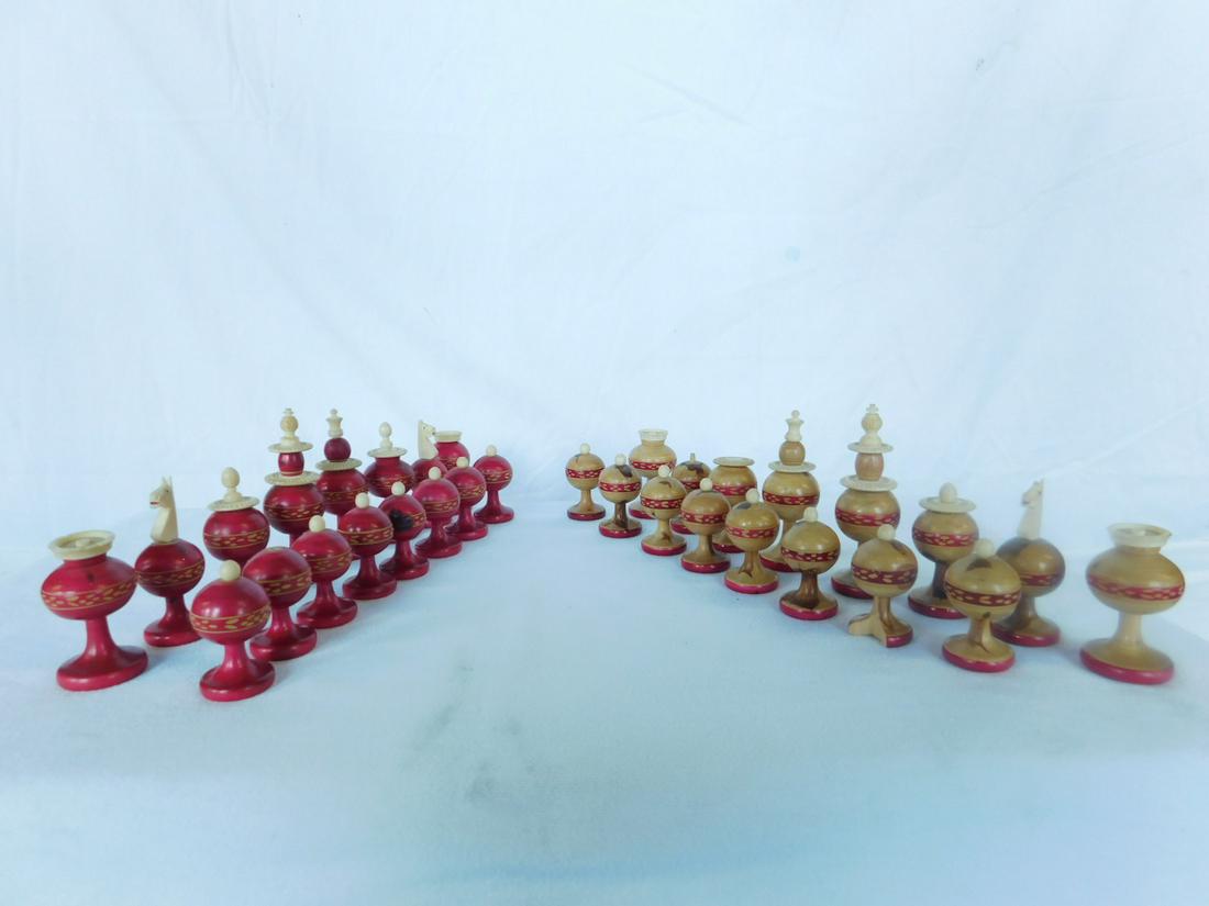 Bone & Wood Chess Set: Note; THERE IS NO CALIFORNIA OR INTERNATIONAL SHIPPING ON THIS ITEM! Bone and Wood Chess Set, turned wood with carved bone crests in polychromed red and natural wood, king 4"h, circa 195-60s. CONDITIO