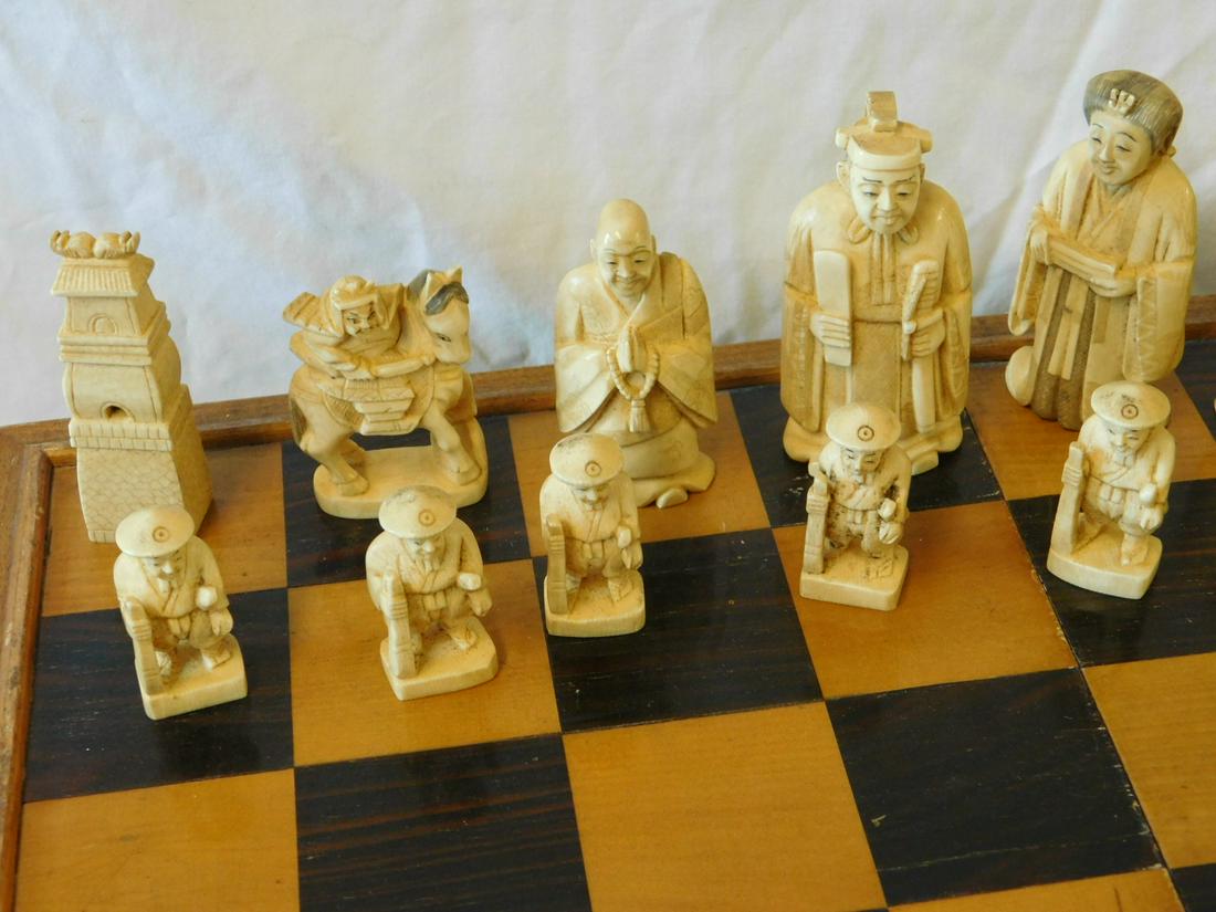 Chinese Figural Bone Chess Set & Case: Note; THERE IS NO CALIFORNIA OR INTERNATIONAL SHIPPING ON THIS ITEM! Chinese Figural Bone Chess Set and Case, features: intricately carved Emperor and Empress, noblemen and peasants and pagoda form ca