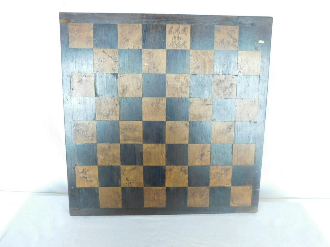 Antique Wood Chess Board: Antique Wood Chess Board, walnut and maple veneers, signed "G.A.K.1884 M.C.K.", 15 1/8" x 15 1/8". CONDITION: Very good wear, appropriate with age and usage, 2 3/4" x 1/2" veneer edge loss on one corn