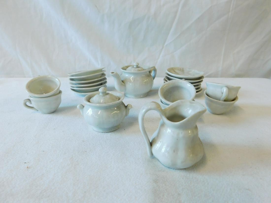 Ironstone Porcelain Child's Dessert Set: Ironstone Porcelain Child's Dessert Set, service for six, includes: teapot, covered sugar, creamer, plates, cups and saucers, late 19th C, includes: pine slide lid box (without the lid), box 8 1/2" x 