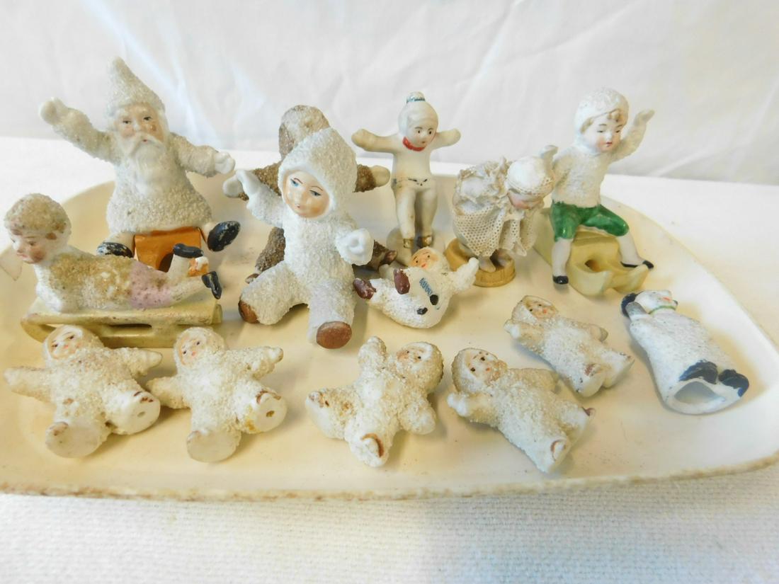 Antique Bisque Snow Baby Figures: Antique Bisque Snow Baby Figures, Germany, sand finish, includes: Santa and two other children on sleds, plus snowman and eight other child figures; also a painted bisque German standing figure and a 