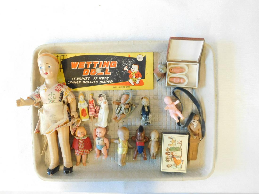 Doll House Dolls Group: Doll House Dolls Group includes: 1 3/4" celluloid Kewpie, 1 3/4" plastic Barbie type doll, 8" all composition doll with jointed arms and other plastic, bisque and composition dolls. CONDITION: Used co