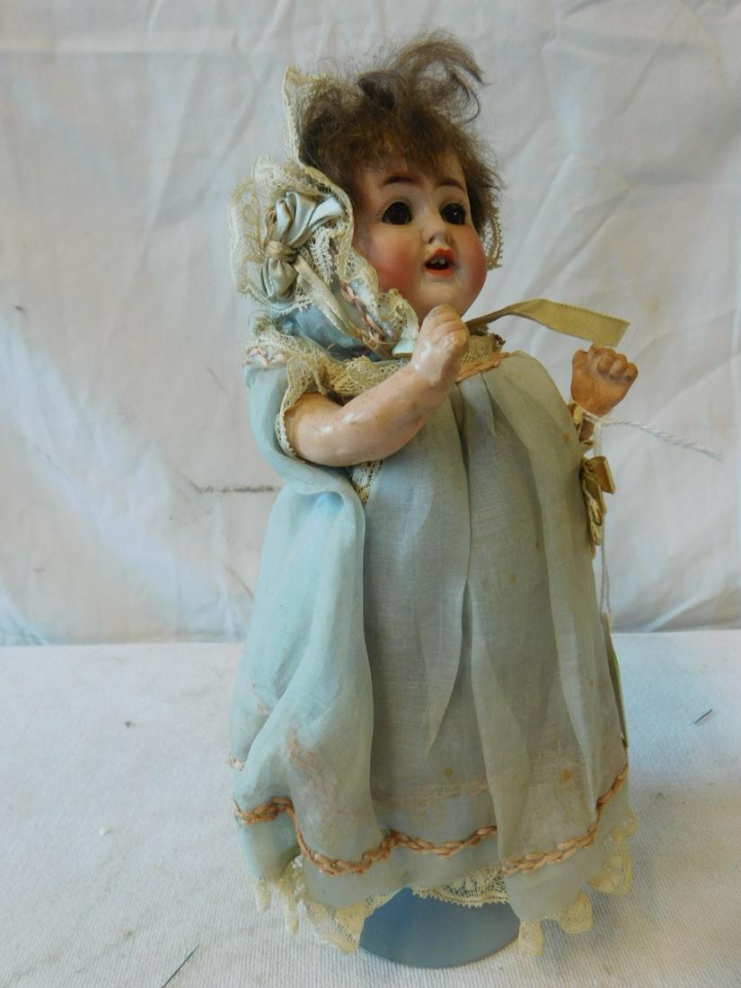 Alt. Beck Gottschalck Bisque Head Doll: Alt. Beck Gottschalck Bisque Head Doll, Germany, socket head, 1361 18, brown sleep eyes, open mouth with teeth,composition baby body, 8", blue lace trimmed bonnet and dress with undergarments. CONDITI
