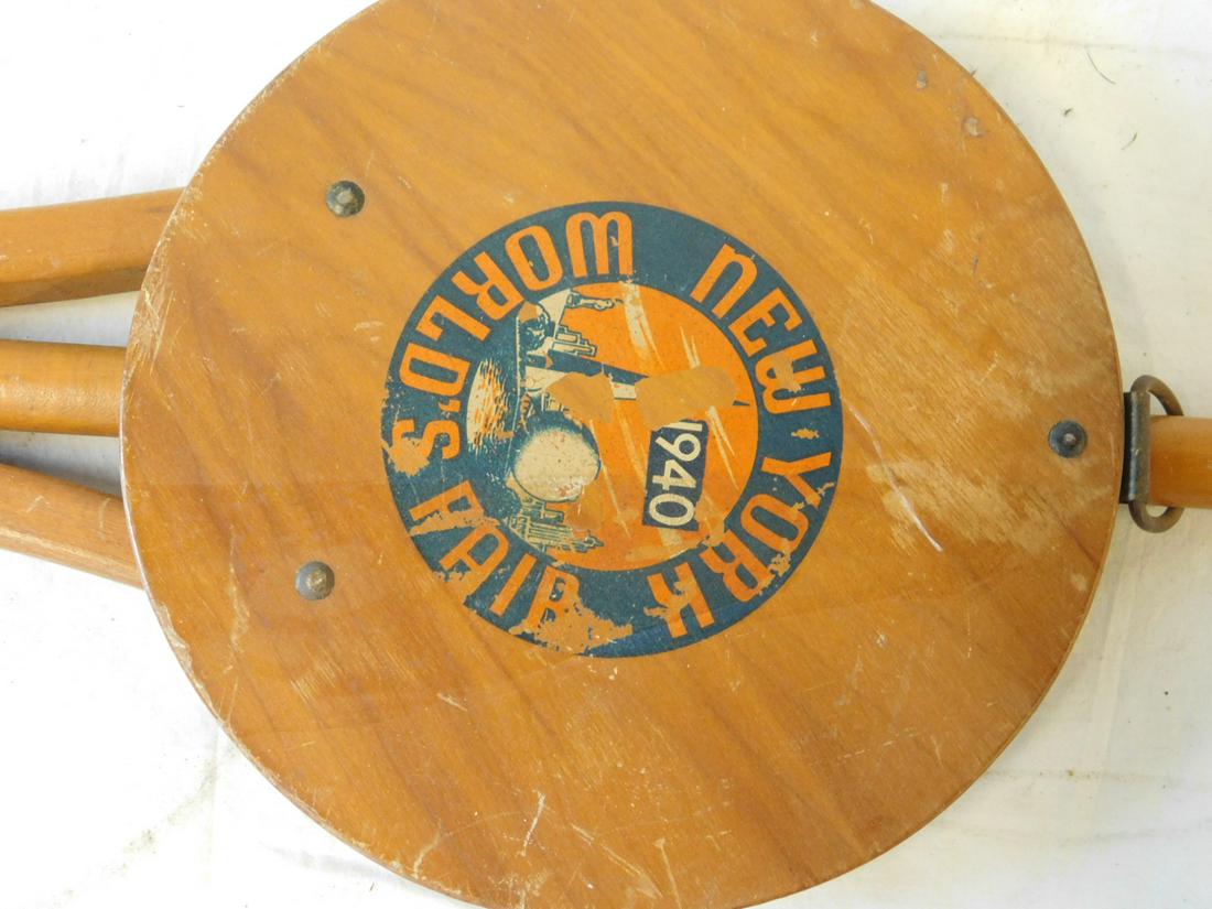 1940 N.Y. World's Fair Seat Cane: 1940 N.Y. World's Fair Seat Cane, fold up round wood plank seat, 9"d x 1/4" thick with metal ring cane shaft holder, opens to tri foot, seat height 18", overall - 28" (open), 35" folded, KAN-O-Seat Pa
