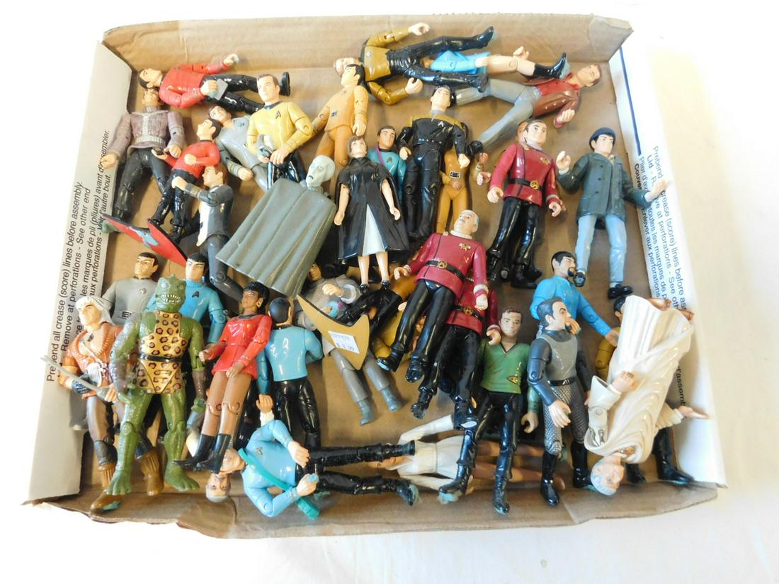 Playmates Star Trek Small Action Figures: Playmates Star Trek Small Action Figures,30+ from original series and movies, mostly main character, 4 1/2" - 5 1/2", c. 1990s. CONDITION: Very good, a few may have blue modeling clay.