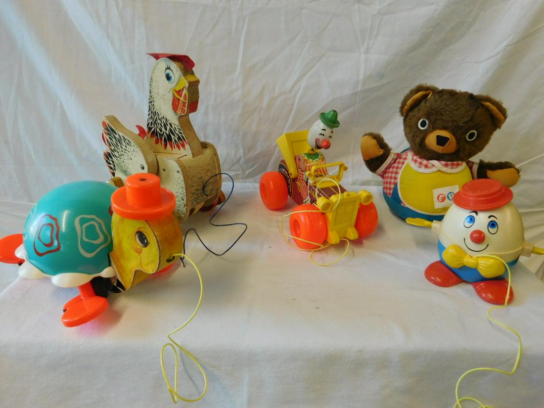 Vintage Fisher Price Pull & Other Toys: Vintage Fisher Price Pull and Other Toys including: large "The Cackling Hen", #120, wood with plastic accents, 9 1/2", Jalopy, 724, wood with plastic wheels and accents,spring clown head, 7 1/2", turt