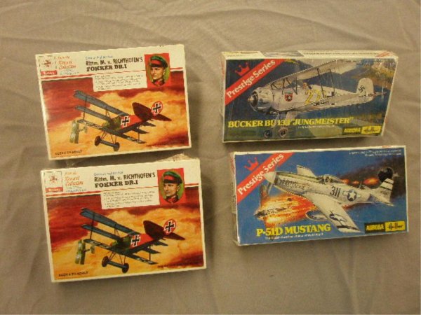 Renwal & Aurora Fighting War Plane Model Kits: 1970's Renwal & Aurora Heller 1/72 scale fighting war plane model kits, (2) Renwal German fighter Ace Rittm. M. v. Richthoffen'e Fokker Dr. 1 & Aurora Heller Prestige Series P-51 D Mustang & Bucker BU