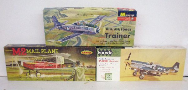1950's & 60's Fighting War Plane Model Kits: 1950's & 60's Monogram exact scale model U.S. Air Force T-28 A Trainer, Aurora 1/4 scale Douglass M-2 U.S. Mail Plane & Hawk 1/4 scale North American P-51D Mustang fighting war & mail plane model kits