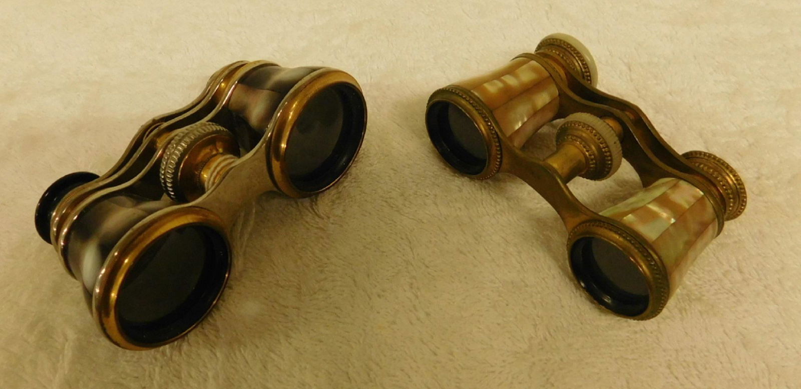 2 Vintage Opera Glasses (As Is): Two Vintage Opera Glasses (As Is) by March and, Paris and Jumelle Flammaridn Paris, both mother of pearl with Dore finished brass, early 20th C. CONDITION: Used, each missing one lens and cover, one w