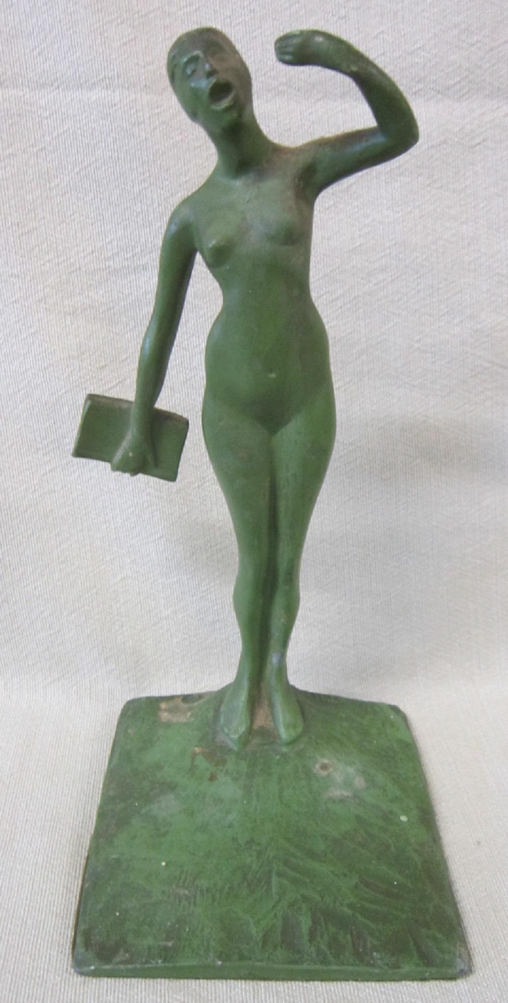 Robert Thew Bronze Female Sculpture: Robert Thew Bronze Female Sculpture, bronze nude female holding book sculpture, untitled, Art Deco period, 8" on a 3 3/4" x 4" base. CONDITION: Needs cleaning, no issues identified.
