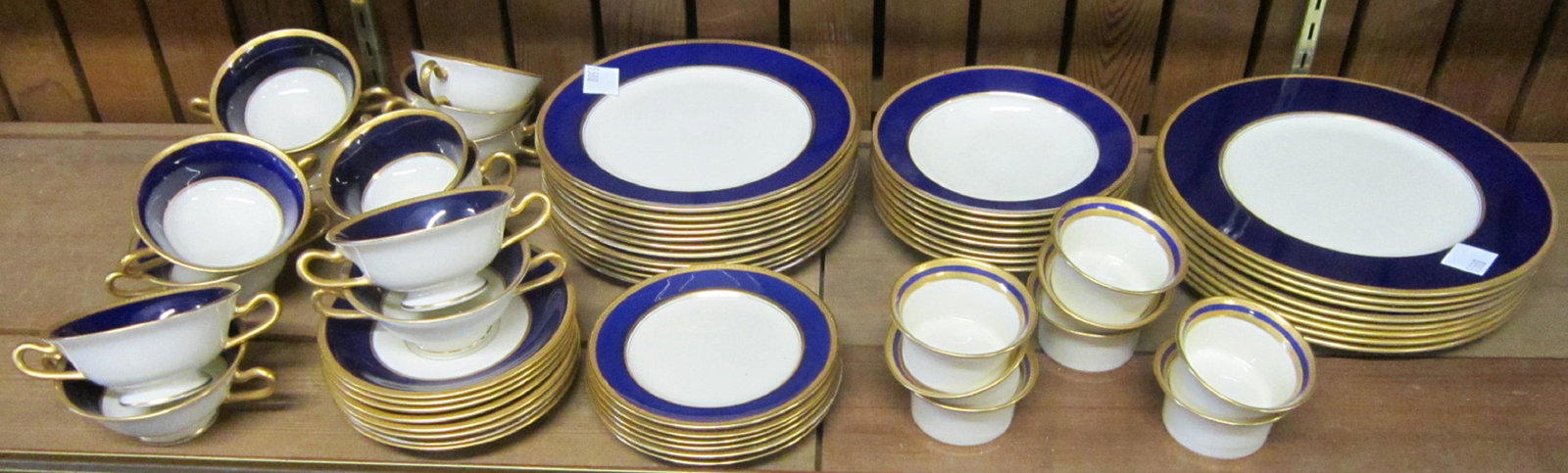 61 Piece Lenox Dinnerware Set: Sixty-one Piece Lenox Dinnerware Set, Independence pattern, specially made for J.E. Caldwell & Co., Philadelphia, PA including: eight 10 1/2" dinner plates, eleven 9" luncheon plates, eight 7 3/8" sha