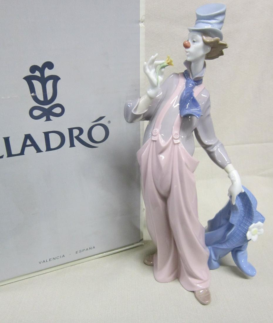 Lladro Porcelain Figure, NIB: Lladro Porcelain Figure "A Mile of Style", #6507, 13 7/8"h, 1998 Vanguard Exclusive figurine, Jose Luis Santes, sculptor, retired, with booklet and certificate in box, store stock, new in box. CONDITI