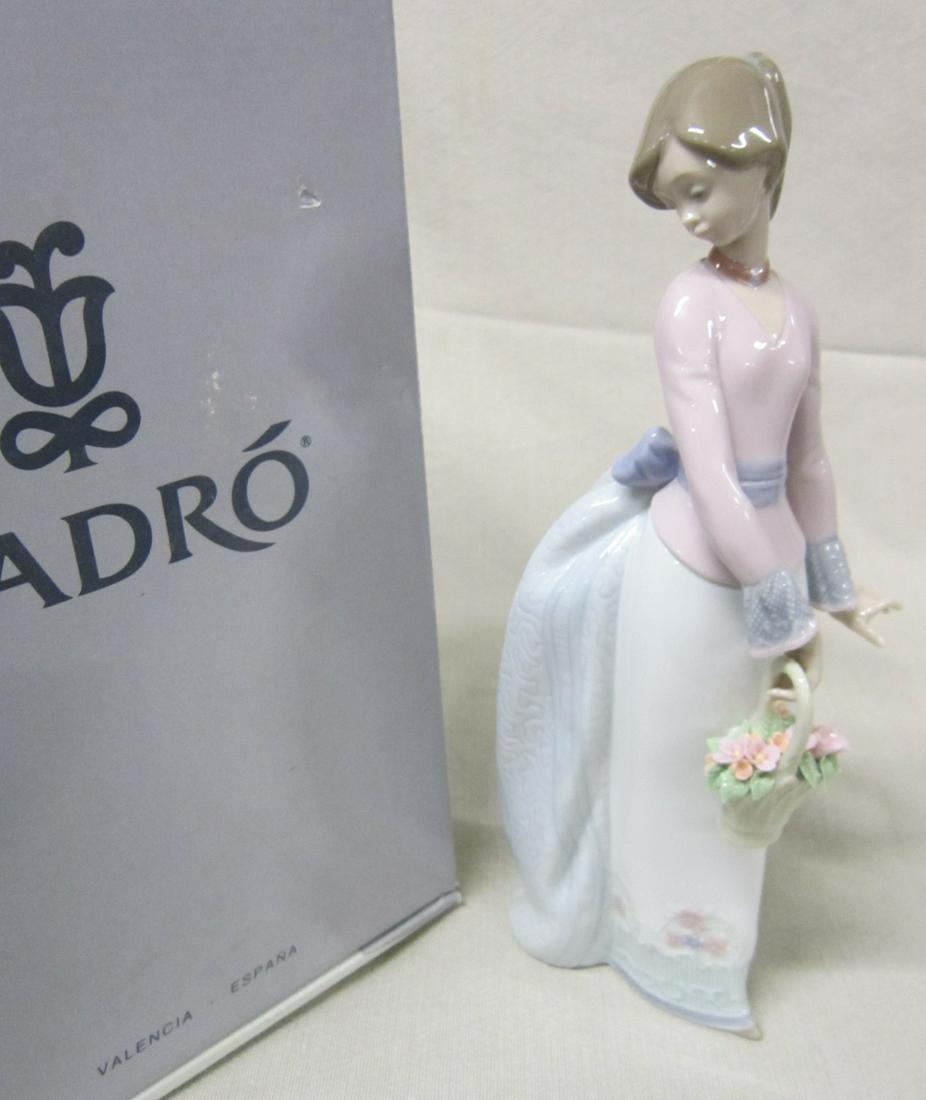 Lladro Porcelain Figurine NIB: Lladro Porcelain Figurine "Basket of Love", #7622, 9 3/4", 1994 Collectors Society, Jose Puche, sculptor, retired with pamphlet in box, store stock, new in box. CONDITION: New in box.