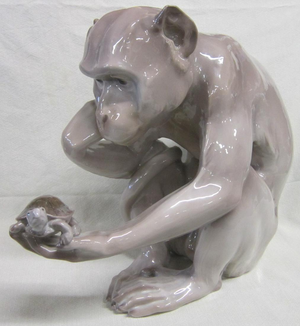 B & G Monkey & Tortoise Porcelain Figurine: Bing & Grondahl Monkey studying Tortoise with etched artist signature Dahl Jensen, 1902 and Bing & Grondahl, Copenhagen porcelain, made in Denmark mark, 1545 SA, under figure, 15 3/4" x 8" x 13"h, sto