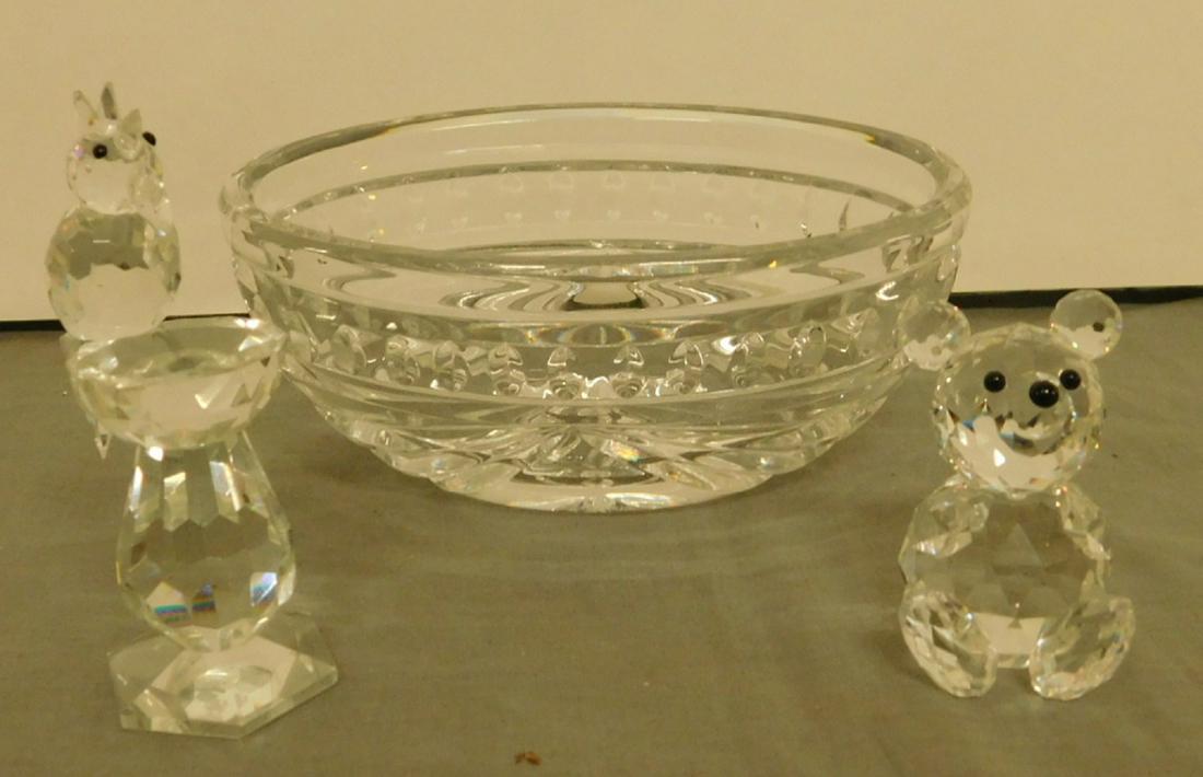 3 Swarovski & Waterford Pieces: Three Swarovski & Waterford Pieces includes: Swarovski 2" bear cub, Swarovski cockatoo at bird bath, 3 1/2"h, and an oval Waterford bowl, 5" x 3" x 2 1/4". CONDITION: Very fine, no issues identified.