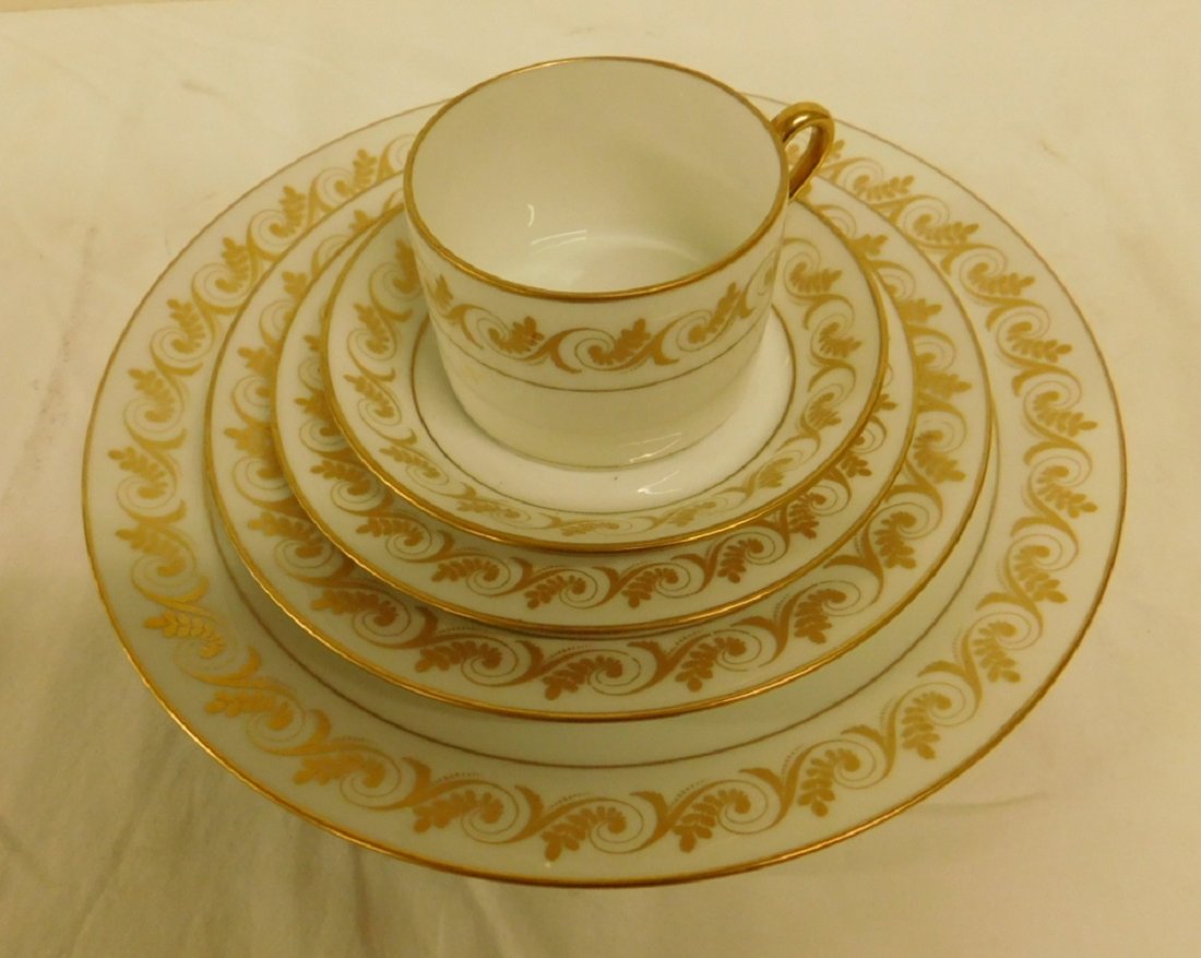 Richard Ginori China Service: Richard Ginori china service, Italy, gilt foliate scroll pattern includes 11 dinner plates, 10 1/4" diam., 12 luncheon plates, 7 3/4" diam. 12 salad plates, 6 1/4" diam. 12 dessert bowls, & 11 mugs Co
