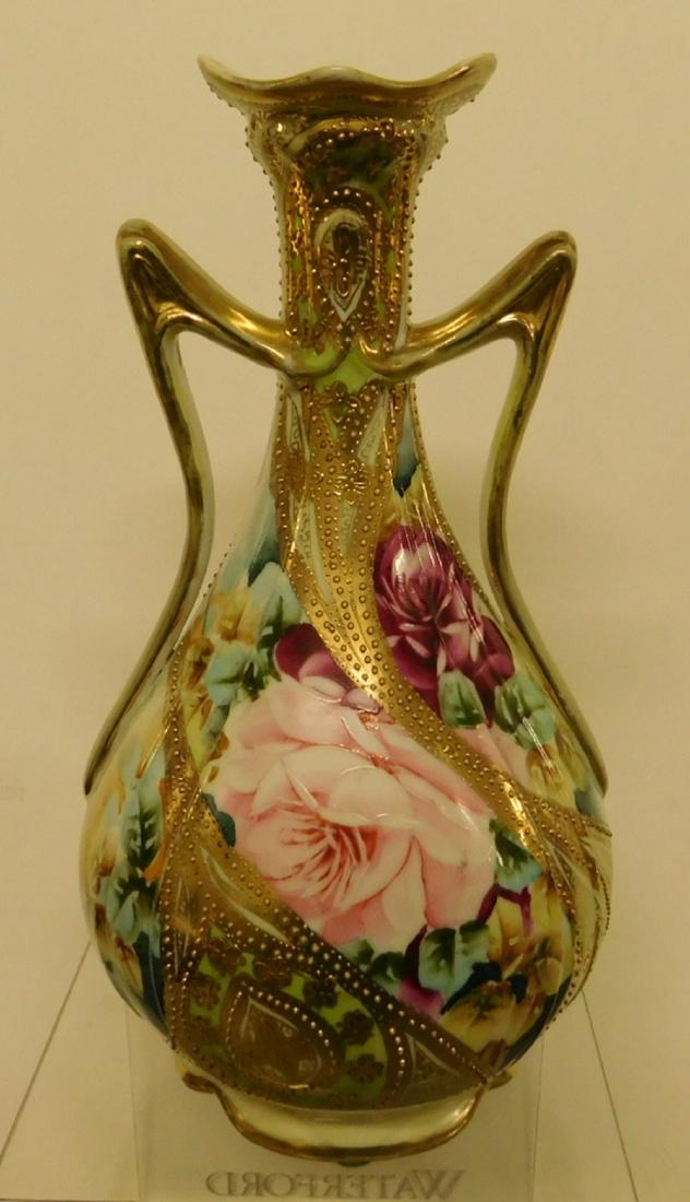 Hand Painted Nippon Vase: Hand Painted Nippon Vase, double handle with pink roses and an abundance of gilt highlights, early 20th C, 10"h. CONDITION: Very fine, minimal gilt wear.