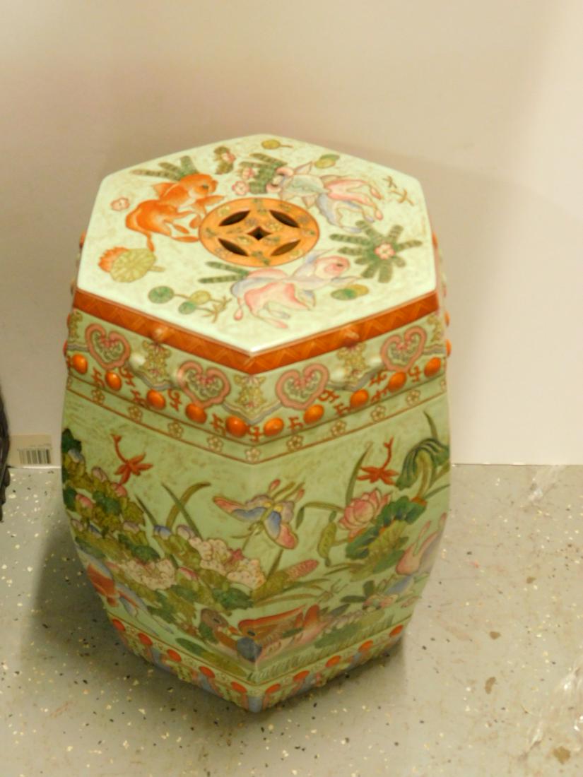 Chinese Porcelain Garden Stool: Chinese Porcelain Garden Stool, hexagon form with painted pond scenes of birds, flowers and insects, late 20th C, 19"h. CONDITION: Very good.