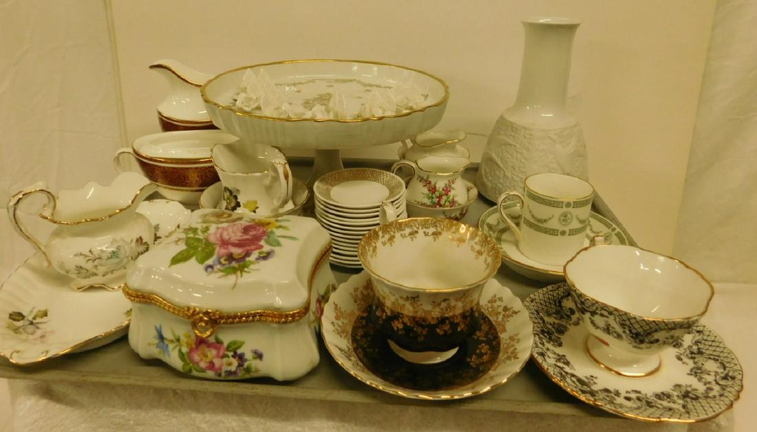 Large Group of Fine China: Large group of fine china includes Shumann water bottle, 4 sugar & creamer sets, 3 cups & saucers, Limoges covered jewel box, 15 Spode butter pats, 6 Staffordshire place markers, French cake stand, et