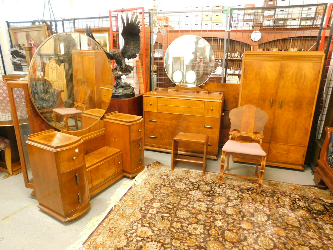 Art Deco 8 Pc Bedroom Set: Art Deco eight piece Bedroom Set, matched walnut veneers, includes: armoire, bureau, two round mirrors, vanity, chair, bench, full size bed, circa 1930s-40s. CONDITION: Very good, small areas finish w