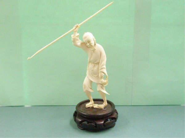 Chinese Ivory Fisherman with Spear: Chinese ivory fisherman with spear, wood base, hgt 6 1/2", early 20th c., [28] No International Shipping
